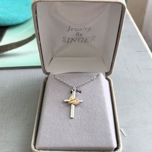 Two tone silver/gold necklace of cross and dove